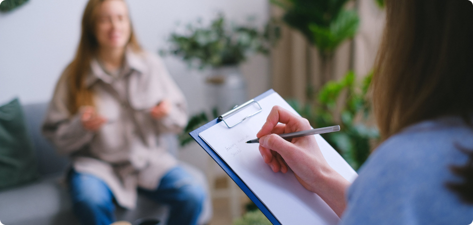 Therapist taking Therapy Notes